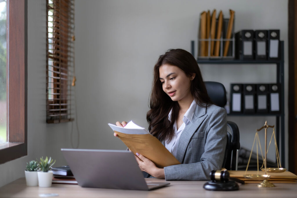 asian lawyer woman working with a laptop computer 2023 11 27 05 26 09 utc