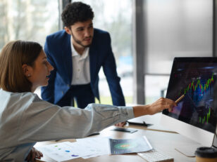people office analyzing checking finance graphs scaled